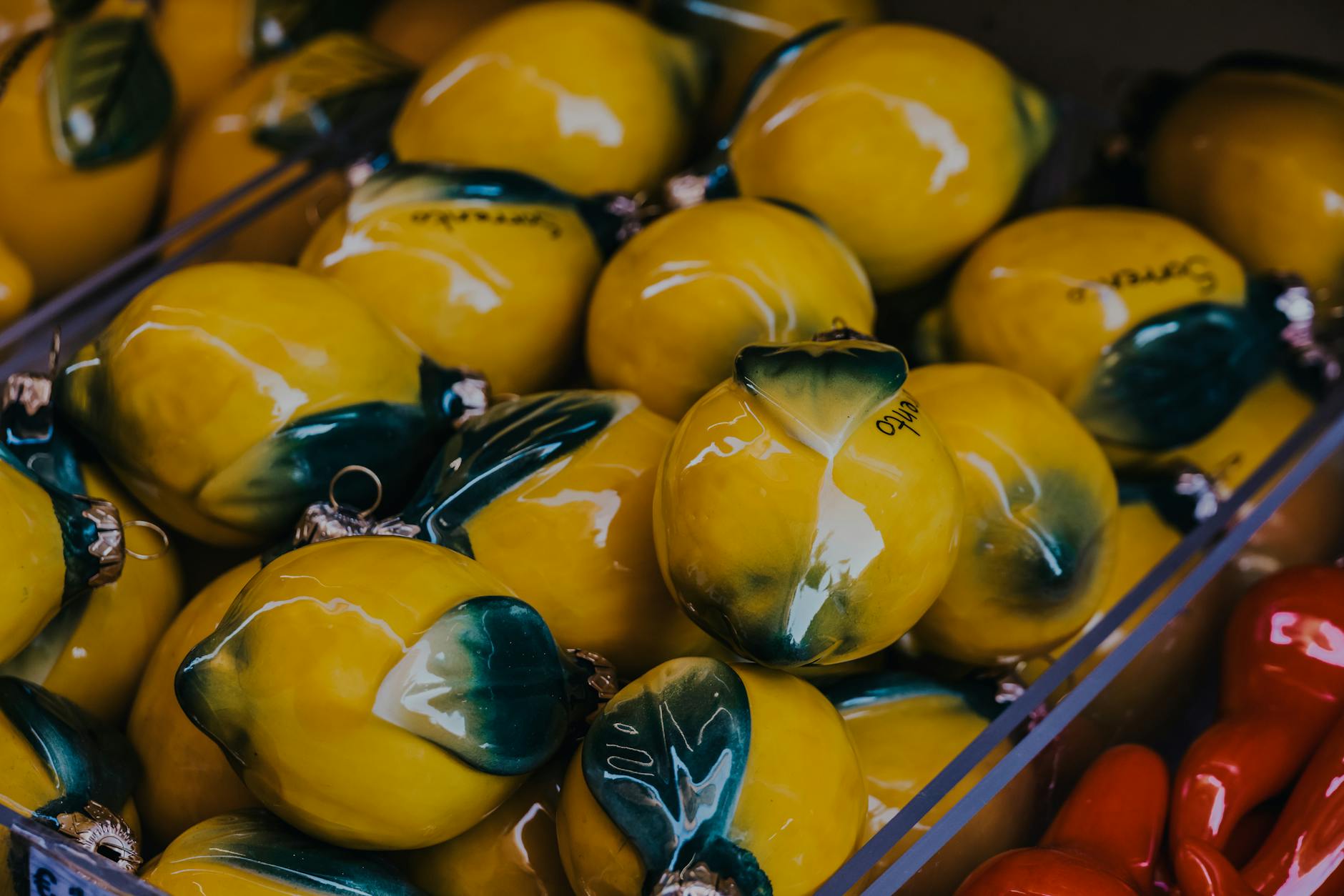 Vibrant yellow ceramic lemons artfully displayed, representing reconnection and renewal